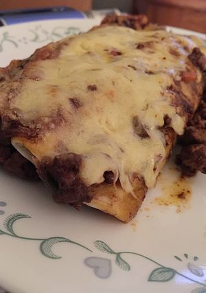 A picture of Beef Mole Enchiladas.