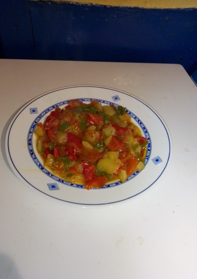 Una foto de Pimientos con patatas