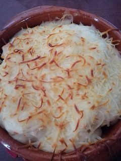 Una foto de Coliflor gratinada con bechamel de jamón