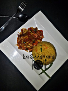 A picture of Couscous and veggies sauce.