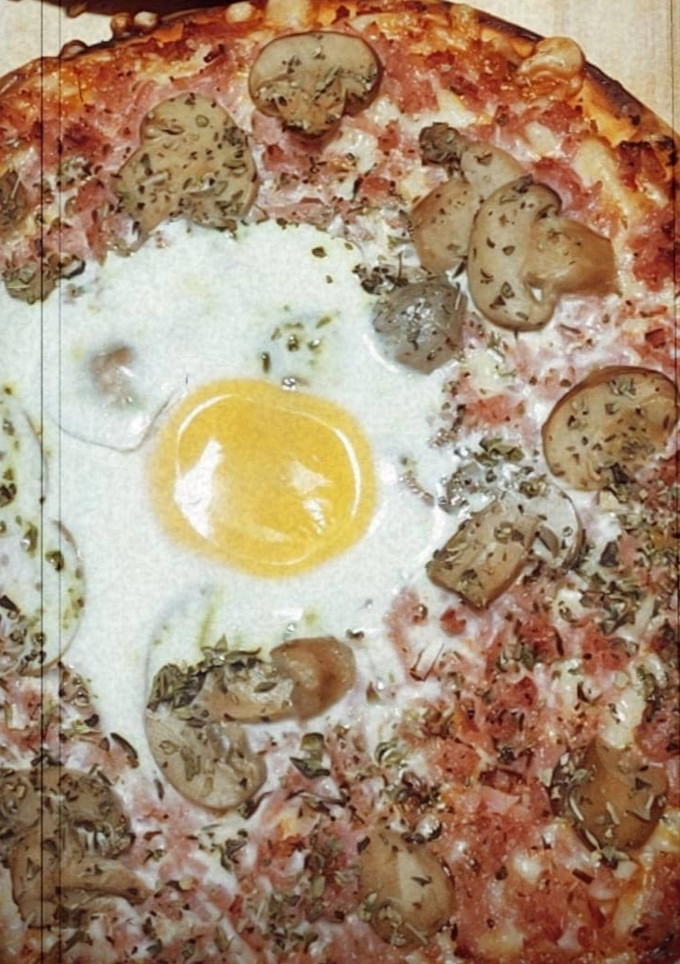 Una foto de Pizza