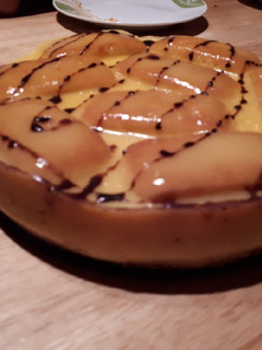 Una foto de Tarta de flan con base de galletas y magdalenas