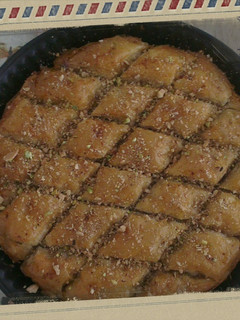 A picture of Baklava with Honey and Nuts.