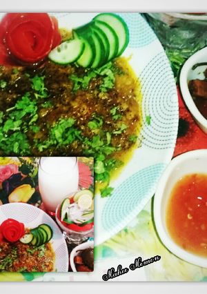 A picture of Black paper turee Sabzi salan with chatni achar salad & lassi.