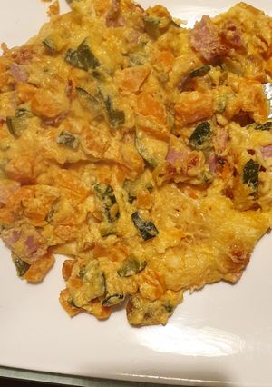 Une photo de Gratin courgettes patates douce et bacon