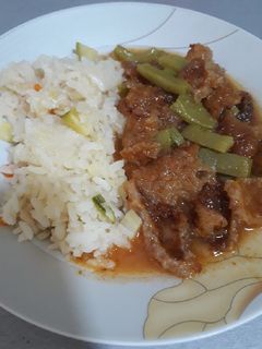 Una foto de Chicharrón en salsa roja