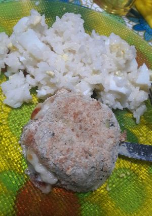 Una foto de Milanesas de zapallito verde rellenas de jamón y queso