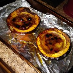 A picture of Sweet & Saucy Cranberry-Mango Baked Acorn Squash.