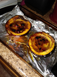 A picture of Sweet & Saucy Cranberry-Mango Baked Acorn Squash.