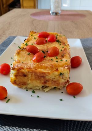 Una foto de Pastel de patatas jamón York y queso (cake)