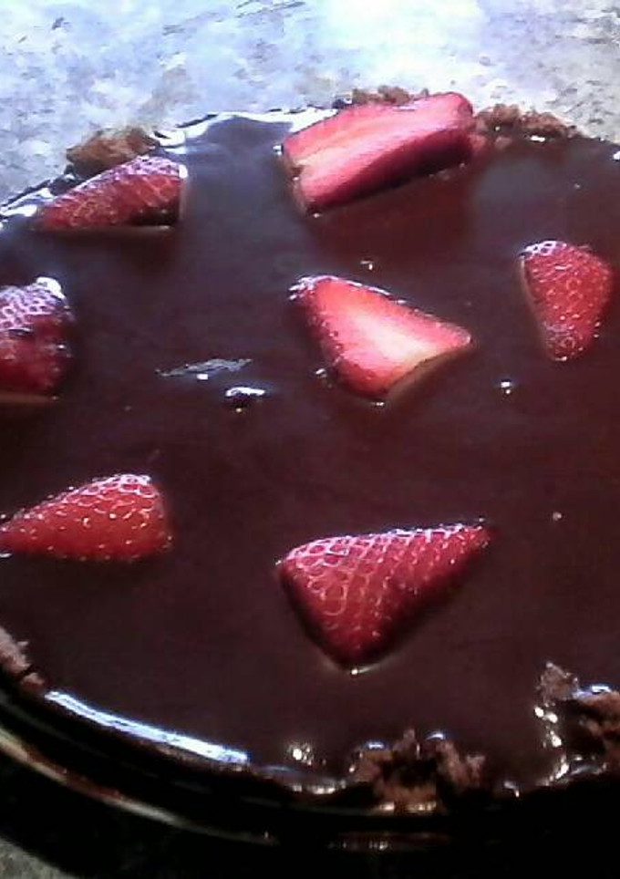 Una foto de Tarta de Chocolate y fresas
