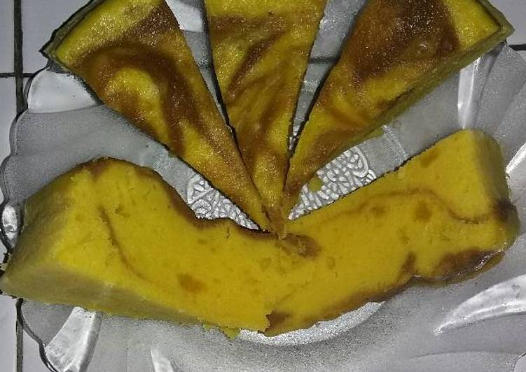 Proses memasak Bolu Labu Kuning Empuk yang Bisa Manjain Lidah