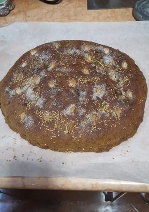 Una foto de Torta de aceite con chocolate y almendras