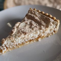 Apricot and Coconut meringue tart - South African Hertzoggies A picture of Apricot and Coconut meringue tart - South African Hertzoggies.
