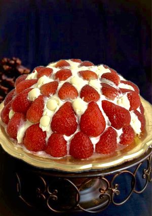 A picture of Chocolate Dome with Strawberries and Milk Cream.