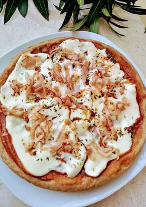 Una foto de Pizza de harina integral