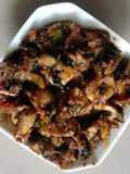காளான் மிளகு பிரட்டல் (Mushroom pepper pirattal recipe in tamil)