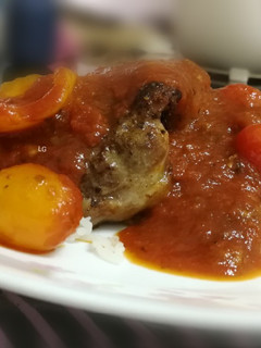 A picture of Pork Sirloin Steak With Tomato Pasta Sauce On Rice.