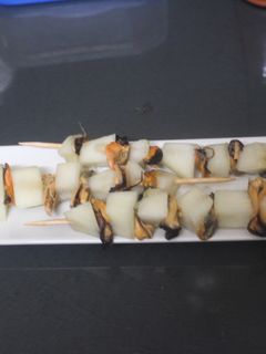 Una foto de Brochetas de melón con mejillones
