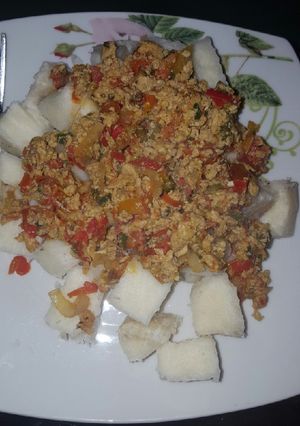 A picture of Yam cubes with egg sauce.