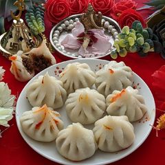 A picture of Steamed Rava modak.