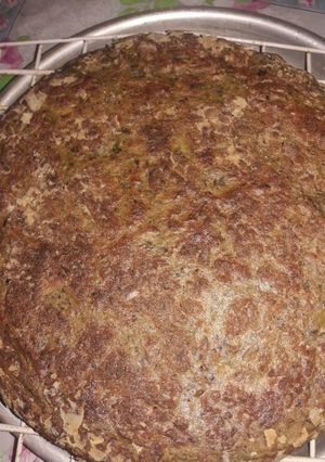 Una foto de Torta salada con pencas de acelga