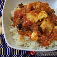A picture of Chicken with olives.