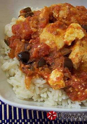 A picture of Chicken with olives.