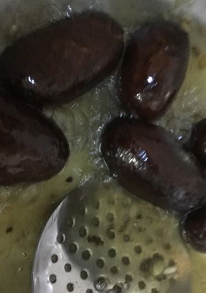 A picture of Black Gulab Jamun.