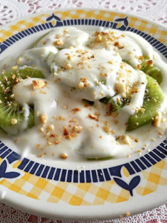 Una foto de Kiwis con crema
