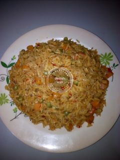 Jollof rice with vegtbls ainihin hoton girkin