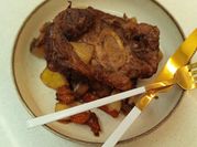 Una foto de ossobuco braseado