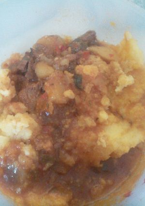 Una foto de Polenta con tuco