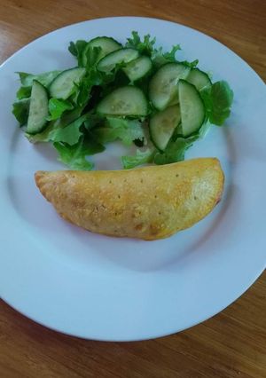 A picture of Veg Ď samosa.