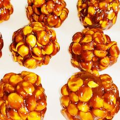 A picture of Roasted chana dal laddu.