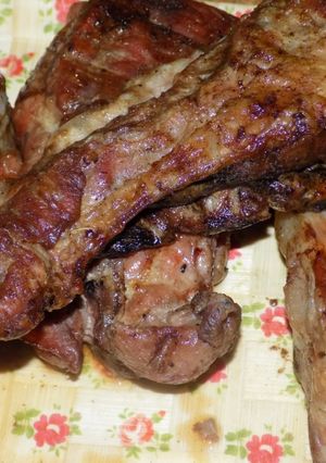 Una foto de Asado, pechito y bondiola de cerdo a la parrilla saborizados