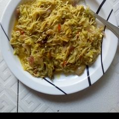 A picture of Indomie with dry fish.