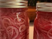 A picture of pickled red onion