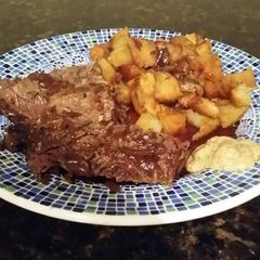 A picture of Brad's beef braised in stout with sweet potato and parsnip medly.