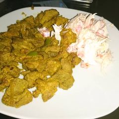 A picture of Fried Pork and Colslaw salad.