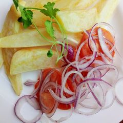 A picture of Fried potato wedges.