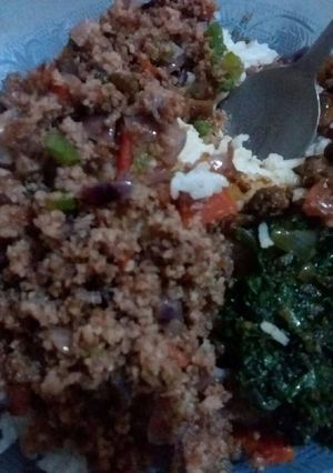 A picture of Fried Minced meat, spinach with rice.