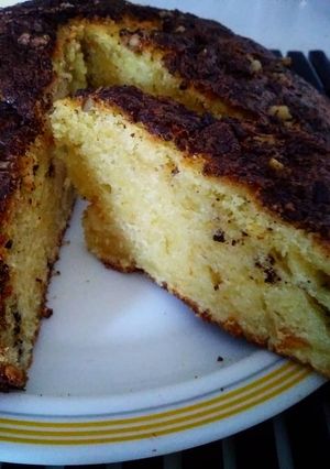 Una foto de Bizcocho de naranja con nueces y chocolate
