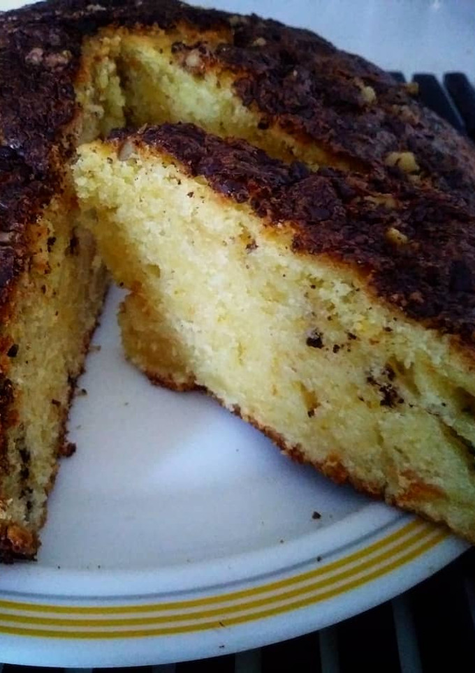 Una foto de Bizcocho de naranja con nueces y chocolate