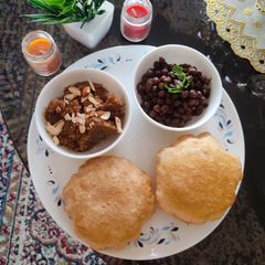 A picture of KALA CHANA with SUJI HALWA & PURI (Navratri navami prasad)...