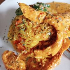 A picture of Nandos style spicy rice.