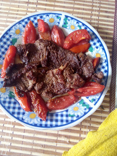 Una foto de Bisteck entomatado