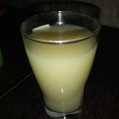 A picture of Coconut and pineapple drink.