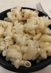 A picture of Mac N Cheese pasta.