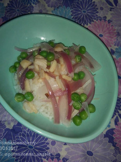 A picture of Scallop Soup with Rice.